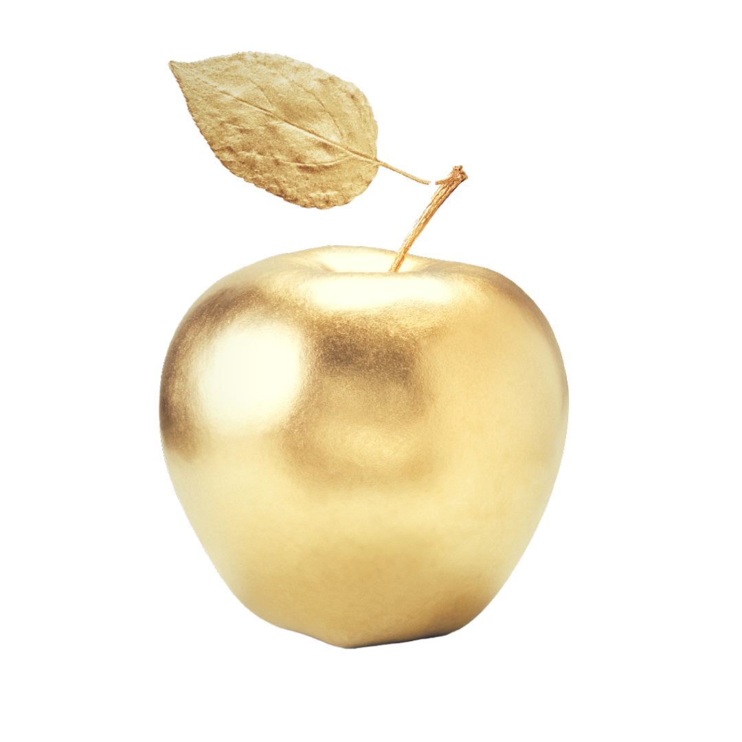 Golden apple with a brown stem and dried leaf on a black background.